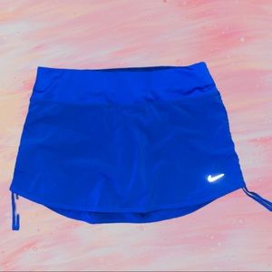 Nike blue tennis mini skirt with roushing details on the sides built in shorts